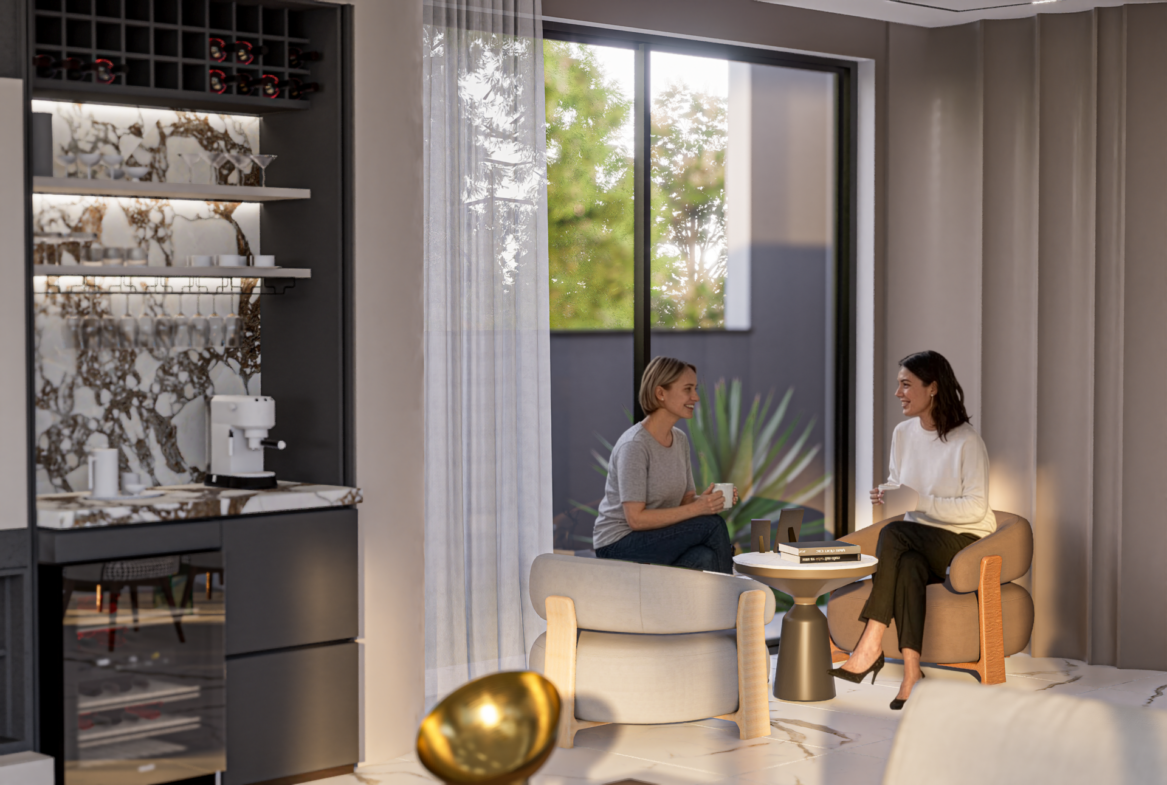 Elegante Coffee Lounge in der Luxusvilla Nehirsu 7 – Designer-Sessel, Barbereich und große Fenster.
