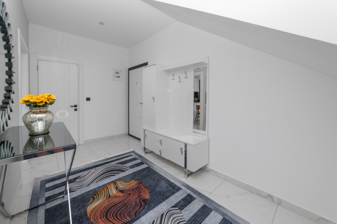 Modern entrance area of a 3-room apartment in Mahmutlar with wardrobe